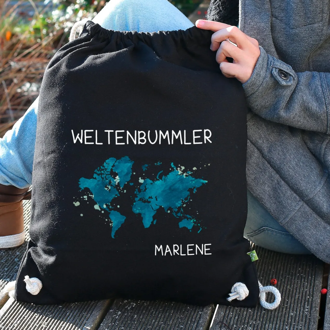 Baumwoll-Sportbeutel für Weltenbummler mit Namen in Schwarz