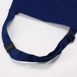 Dunkelblaue Kinderschürze mit Namensaufdruck und Farbklecks-Motiv