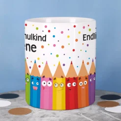 Endlich Schulkind Tasse mit lustigem Stiftemotiv und Namensaufdruck