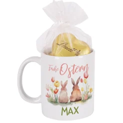 Frohe Ostern - Tasse mit Hasen, Blumen, Name - gefüllt mit Lindt Schokoherzen