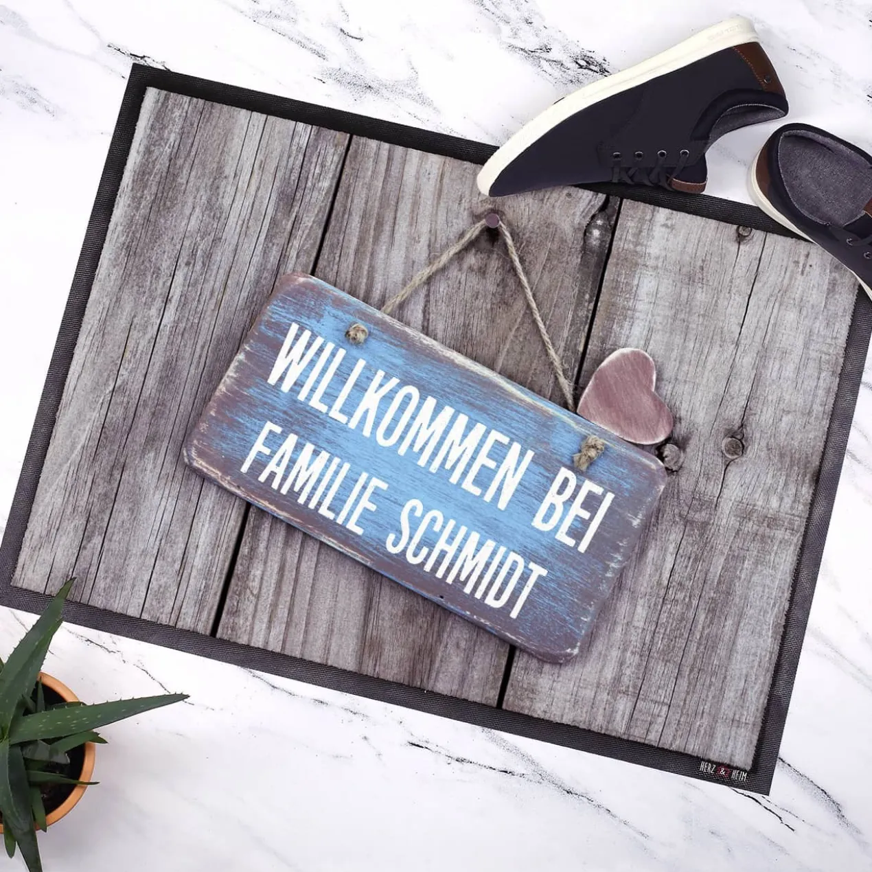Fußmatte -Willkommen bei..- mit Ihrem Wunschnamen