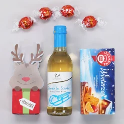 Geschenkkorb mit Lindorkugeln, Tee und Glühwein zu Weihnachten
