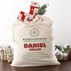Geschenksack aus der Weihnachtspost-Filiale mit Ihrem Wunschnamen bedruckt