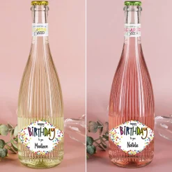 Happy Birthday - Fruchtsecco in zwei Sorten mit Ihrem Wunschnamen zum Geburtstag