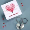 Herz-Paaranhänger mit Name & Datum graviert in Geschenkbox