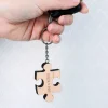 Holzanhänger in Puzzleform mit Gravur Ihrer Namen
