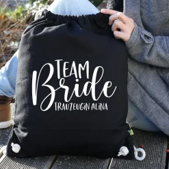 JGA Baumwoll-Rucksack mit Wunschname | Team Bride | Schwarz & Natur