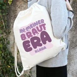 JGA Baumwoll-Rucksack mit Wunschname für die Braut-to-be | Schwarz & Natur