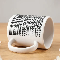 Kaffeetasse 'Blöder Scheißtag' | Tasse mit versteckter Botschaft als lustiges Geschenk mit Humor
