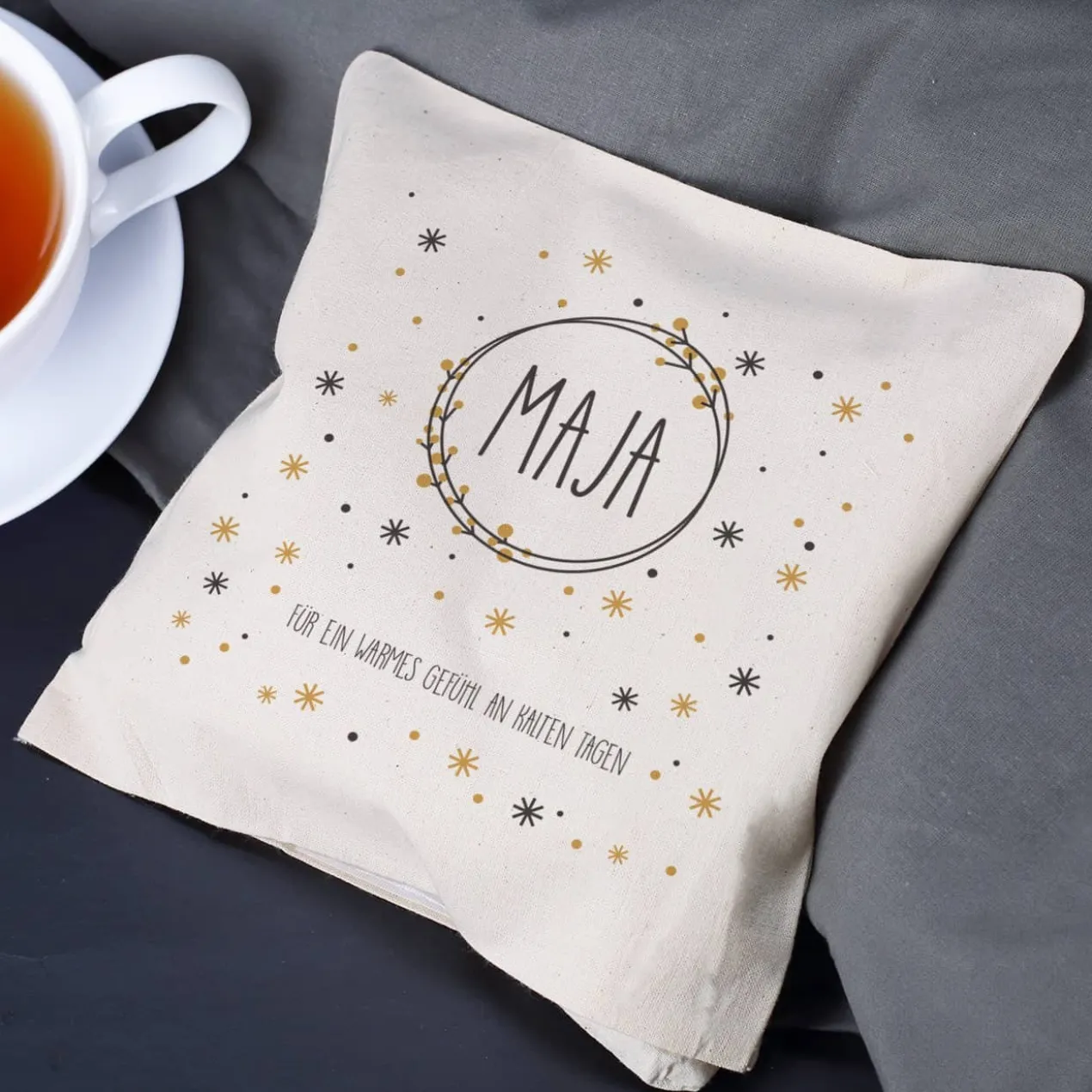 Kirschkernkissen mit Schneeflocken Motiv, Name und Text