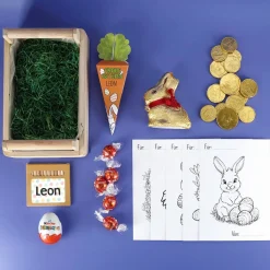 Osternest für Kinder mit Ausmalbildern, Buntstiften und Schokolade
