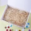 Osternest to go bunte Geschenkbox mit Holzwolle und Name