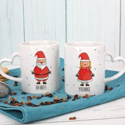 Paartassen mit Herzhenkel und Weihnachtsmotiv