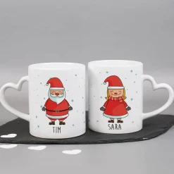 Paartassen mit Herzhenkel und Weihnachtsmotiv