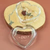 Personalisierte Glasdose in Herzform von Leonardo mit Ringmotiv, Namen, Datum | Geschenk zur Hochzeit