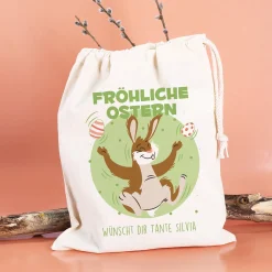 Personalisierter Geschenksack zu Ostern „Fröhliche Ostern“ mit jonglierendem Osterhasen