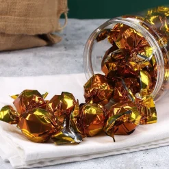 Pralinenflasche - Frohes Fest - mit Haselnuss oder Cappuccino Pralinen