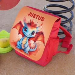 Roter Kinderrucksack mit niedlichem Drachen und Ihrem Wunschnamen