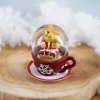Schneekugel Rentier auf roter Tasse
