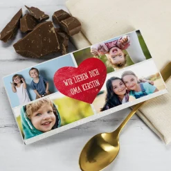 Schokolade mit vier Fotos und Wunschtext im Herz