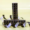 Schwarze Luftschlangen mit Sternen zum 18. Geburtstag