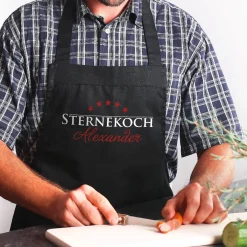 Schwarze Schürze mit Namensaufdruck - Sternekoch