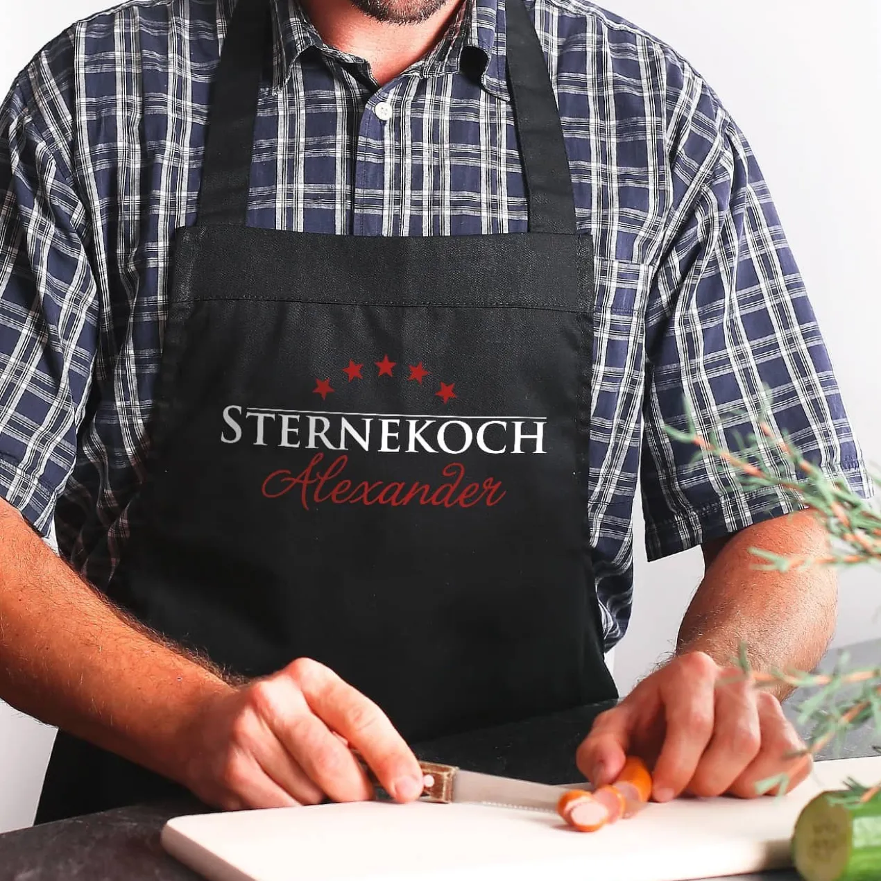 Schwarze Schürze mit Namensaufdruck - Sternekoch