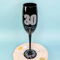 Schwarzes Sektglas mit Glitzerzahl für runde Geburtstage & Jubiläum