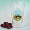 Trinkglas mit grünem Traktor und Name