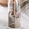Vatertagspost in gravierter Flasche mit Dekoration