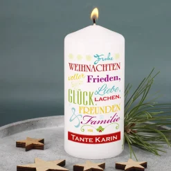 Weihnachtskerze mit Wünschen zum Fest