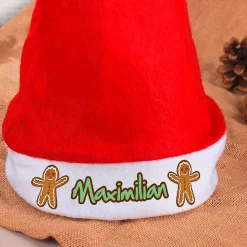 Weihnachtsmütze bedruckt mit Ihrem Wunschnamen und Weihnachtsmotiv