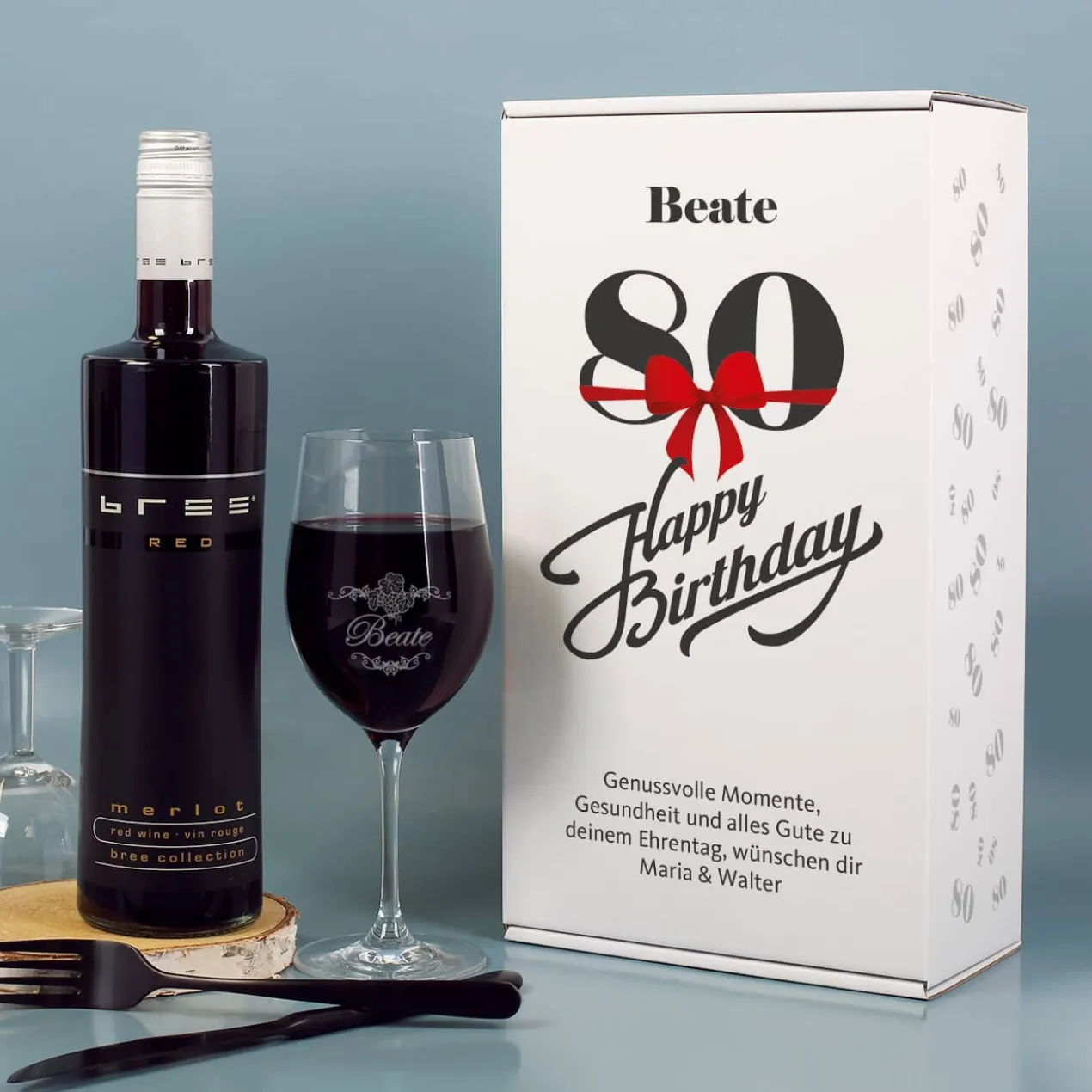Weinset zum 80. Geburtstag mit Weinglas in bedruckter Geschenkverpackung