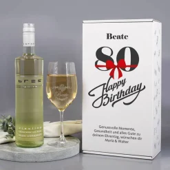 Weinset zum 80. Geburtstag mit Weinglas in bedruckter Geschenkverpackung
