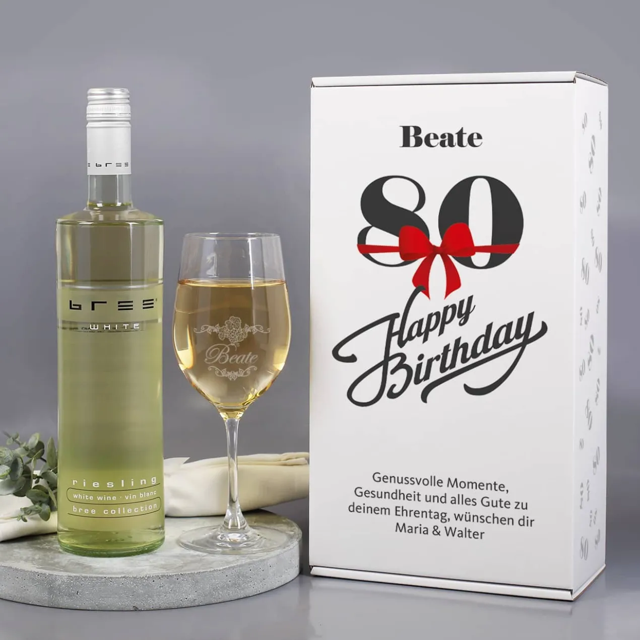 Weinset zum 80. Geburtstag mit Weinglas in bedruckter Geschenkverpackung