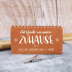 Ziegelstein-Geldclip als Geschenk zum Einzug